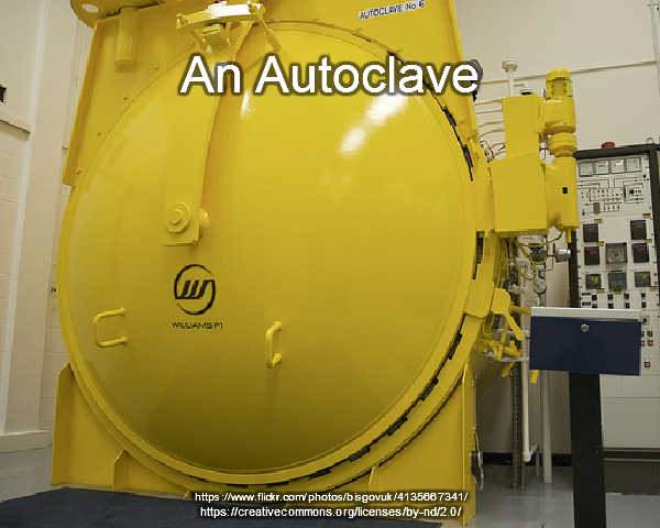 Image shows a small waste autoclave.