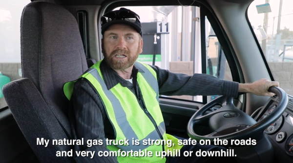 Truck driver in cab tells why he likes RNG HGV fuel.
