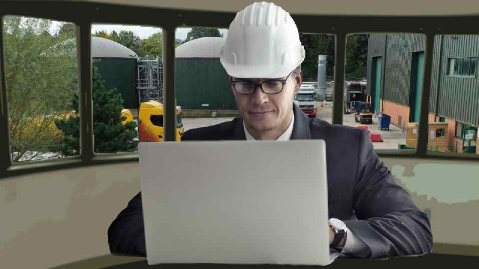 Bioenergy recruiter working on a laptop.