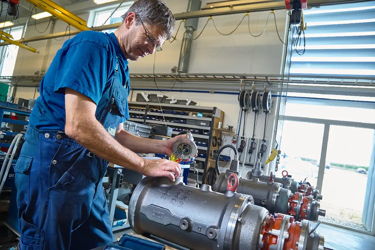 Landia technician wires up a mixer pump
