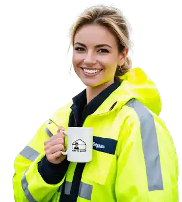 A woman holding a "Born to Biogas" mug.