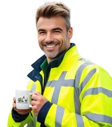 A man holding a BTF mug.